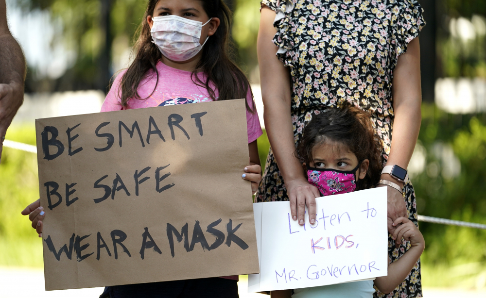 Virus Outbreak Texas Masks