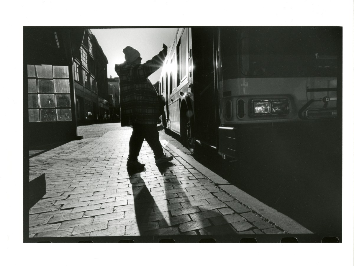 A passenger approaches a bus on the Route 8 line in Portland, Maine, in 2006.